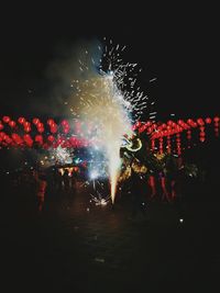 Firework display at night