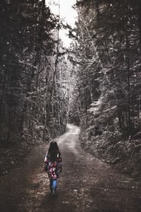 Full length of woman in forest