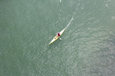 High angle view of people in sea