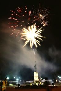 Firework display at night