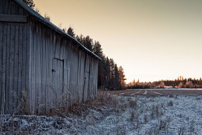 Frosty barn house by the fields