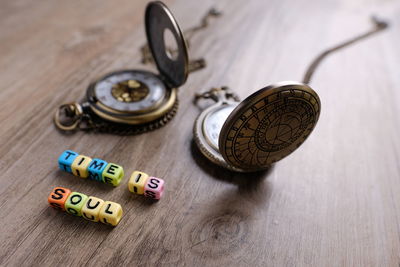 High angle view of text written toy blocks on table