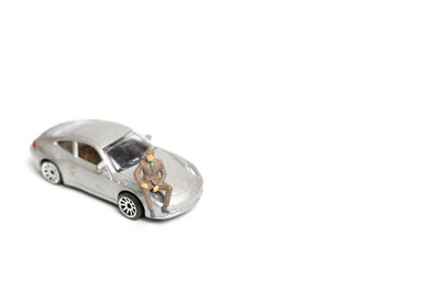 Close-up of vintage car on white background