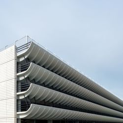 Low angle view of modern building against clear sky