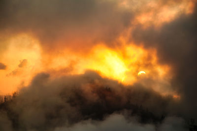 Low angle view of dramatic sky at night