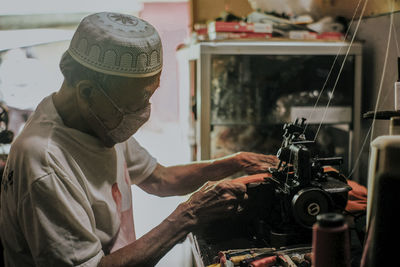 Man working on motorcycle