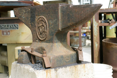 Close-up of rusty anvil in art school