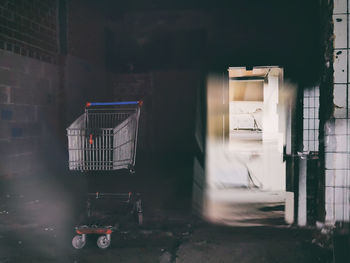 Shopping cart in abandoned building