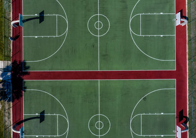 Directly above shot of basketball court on sunny day