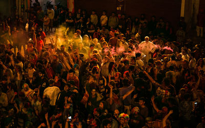 High angle view of people enjoying at night