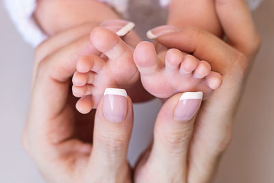 Newborn baby feet. motherhood concept. mother day. copy space. selective focus