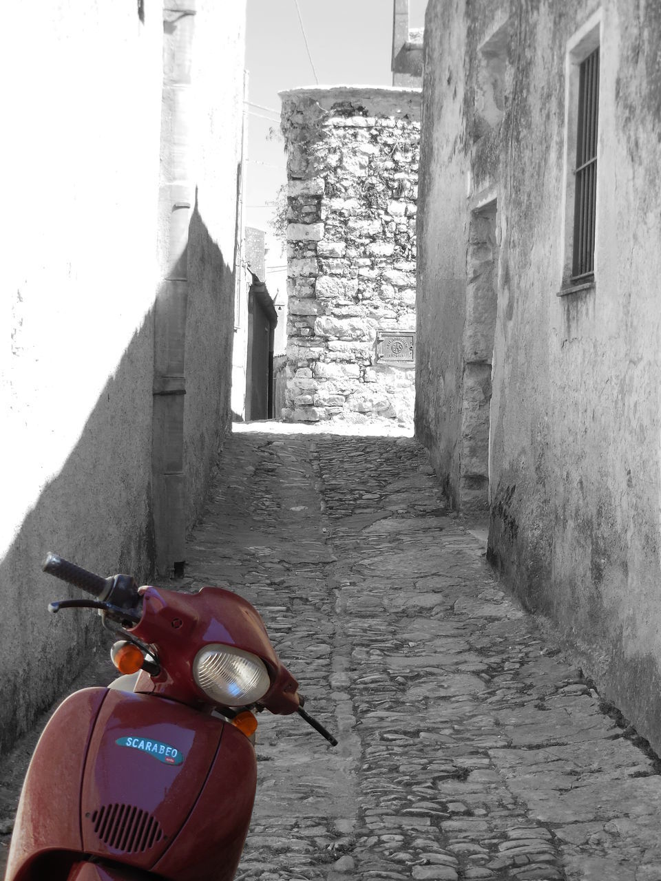 NARROW STREET AMIDST BUILDINGS