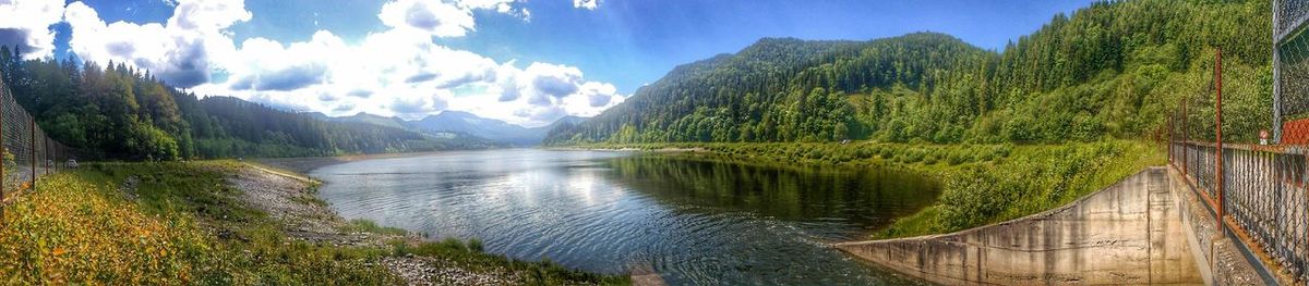 Lake with mountains in background