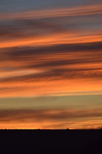 Scenic view of dramatic sky during sunset