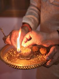 Indian tradation- handmade lamp made out of wheat dough and lit usng cotton wick dip in oil. 