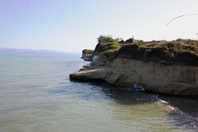 Scenic view of sea against clear sky