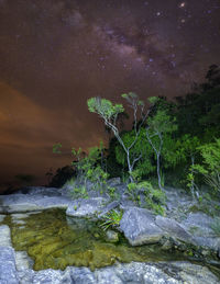 Scenic view of lake against star field