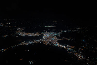 High angle view of illuminated city at night