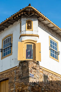 Low angle view of old building against sky