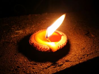 Close-up of illuminated candle