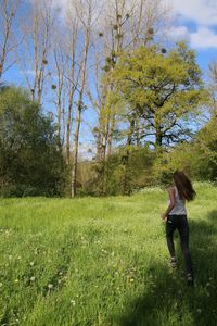 Full length of woman on field