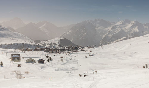 The ski resort of alpe d'huez under the snow in oisans in the alps in france