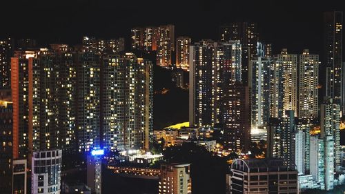 Illuminated buildings in city at night