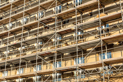 Full frame shot of building with scaffolding