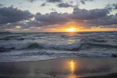 Scenic view of sea against sky during sunset