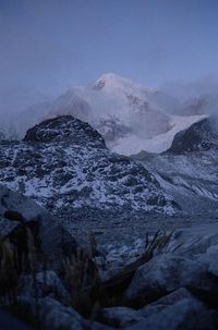 Scenic view of snow covered mountains