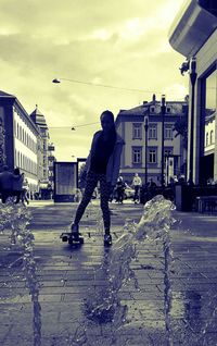 Woman walking on city street