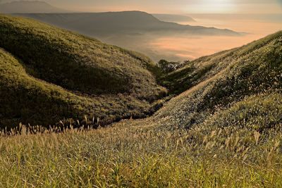 Scenic view of landscape against sky during sunset