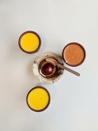 High angle view of drink against white background