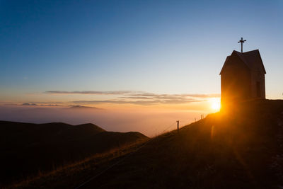 Scenic view of mountains against sky during sunset