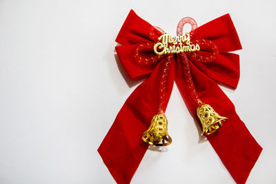 Close-up of christmas decorations over white background