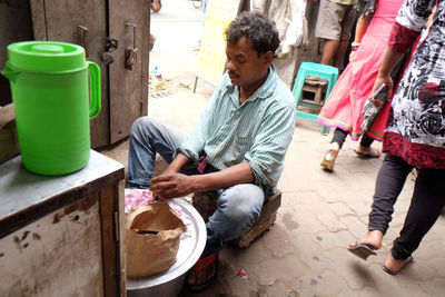 Woman sitting in a market