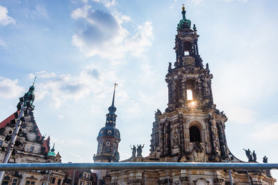 The catholic baroque cathedral of the holy trinity seen through the fence.  dresden, saxony, germany