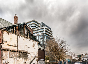 Low angle view of old building against sky