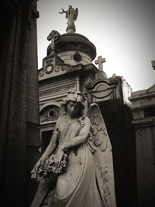 statue, human representation, sculpture, art and craft, art, creativity, low angle view, religion, architecture, built structure, building exterior, spirituality, place of worship, carving - craft product, clear sky, church