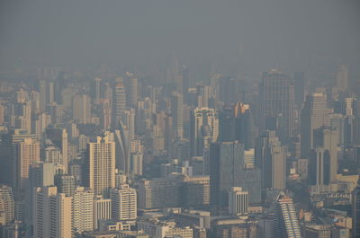 Modern buildings in city against sky