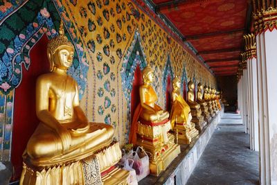 Statue in temple outside building