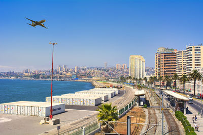 High angle view of cityscape against clear blue sky