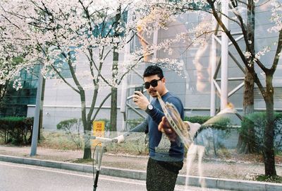 Young man playing in park