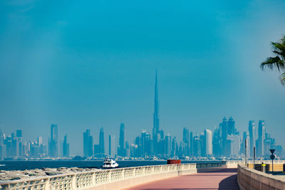 Buildings in city against sky