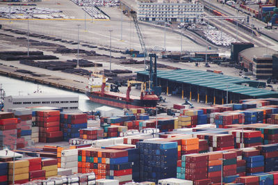 High angle view of commercial dock by buildings