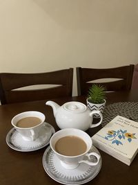 High angle view of coffee cup on table