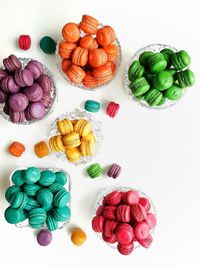 High angle view of multi colored candies on table