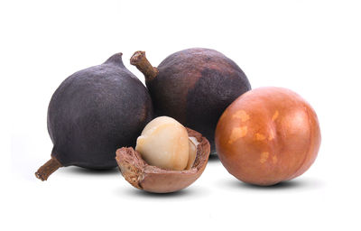 Close-up of oranges against white background