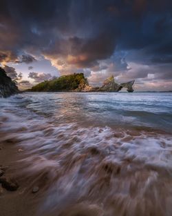 Scenic view of sea against sky during sunset