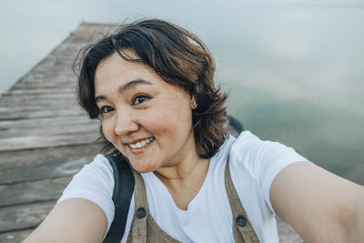 Portrait of young woman looking away